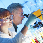 Health care professionals working in laboratory.